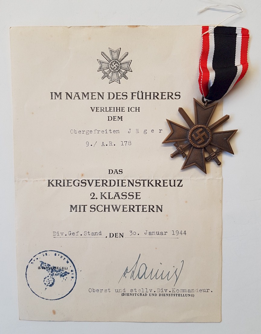 GERMAN WAR MERIT CROSS 2ND CLASS WITH SWORDS WITH AWARD DOCUMENT TO OBERGEFREITEN JAGER